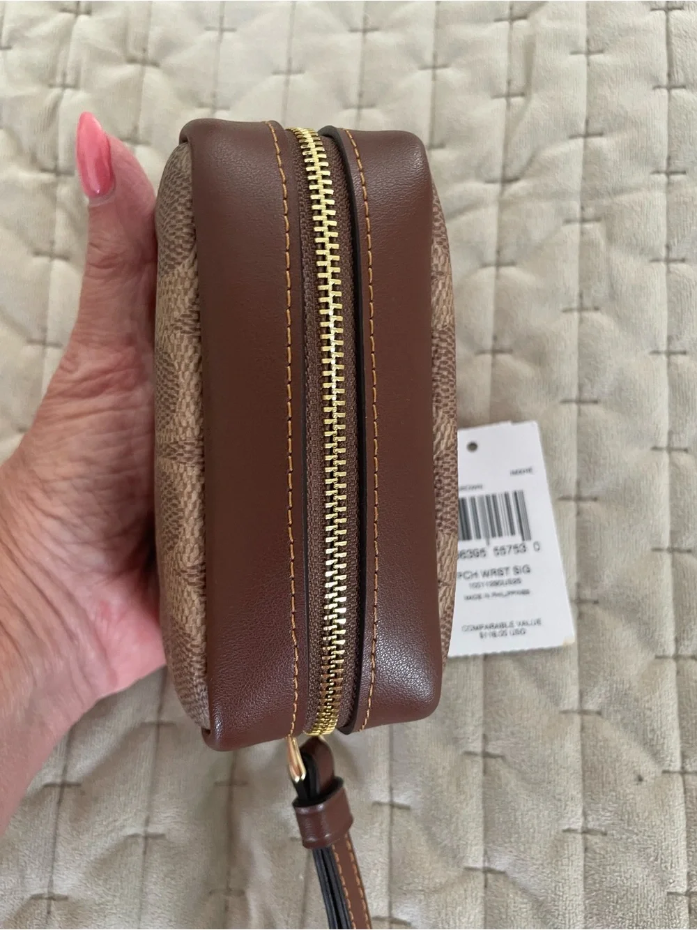 Coach Brown and Tan Interior Zip Pouch wristlet with Gold Hardware